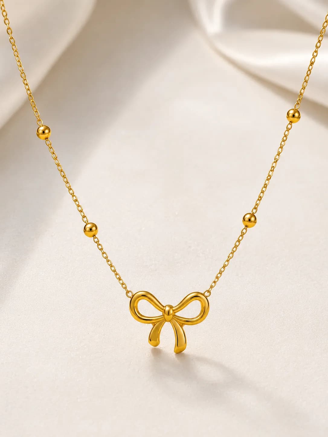 Golden bow chain